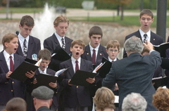 Members of the Boychoir of Ann Arbor singing at AATA headquarters