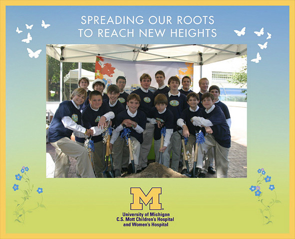 Cantabile poses with shovels and hard hats at Mott Groundbreaking